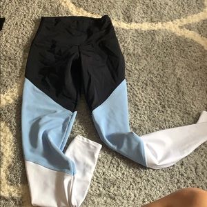 blue white and black revolve leggings